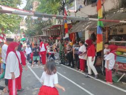 HUT Kemerdekaan RI Ke-79 Aipda Ikhwan Mulyadi Berikan Pelayanan Pengamanan Lomba Warga RW 05 Kelurahan Kampung Rawa.