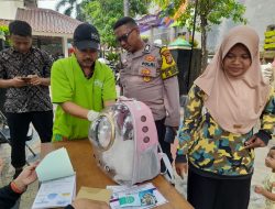Bhabinkamtibmas Kelurahan Sumur Batu Melaksanakan Vaksinasi Rabies oleh Sudin KPKP Jakarta Pusat