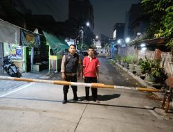 Bhabinkamtibmas Gunung Sahari Sambangi Pos Kamling, Tegaskan Waspada Terhadap Ancaman Keamanan