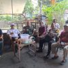 Bhabinkamtibmas Pegangsaan Pantau Kegiatan Normalisasi Drainase di Jalan Talang Ujung