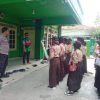 Motivasi Bhabinkamtibmas Terkait Disiplin dan Bela Negara Di SMP Islam Manhalun Nasyiin,
