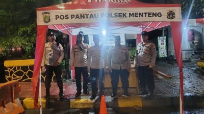 Patroli Cipkon Menteng Laksanakan Pemantauan di  Menteng-Tenggulun Meski Diguyur Hujan Deras