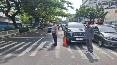 Polsek Sawah Besar Pantau Ibadah Misa Minggu di GKI Samanhudi, Jakarta Pusat