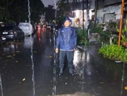 Bhabinkamtibmas Rawasari Lakukan Pemantauan Genangan Air, Pastikan Situasi Aman dan Kondusif