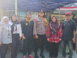 Polisi Kawal Penyaluran Bansos Beras Bulog di Kampung Rawa, Pastikan Bantuan Tepat Sasaran dan Aman