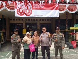 Bhabinkamtibmas Menteng Amankan Distribusi KLJ Untuk 192 Warga Kelurahan Menteng