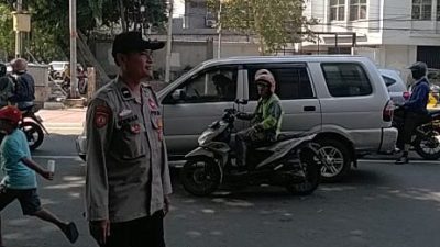 Patroli Patko 1012 Atur Lalin di Depan Holland Bakery, Antisipasi Kepadatan dan Kejahatan Jalanan